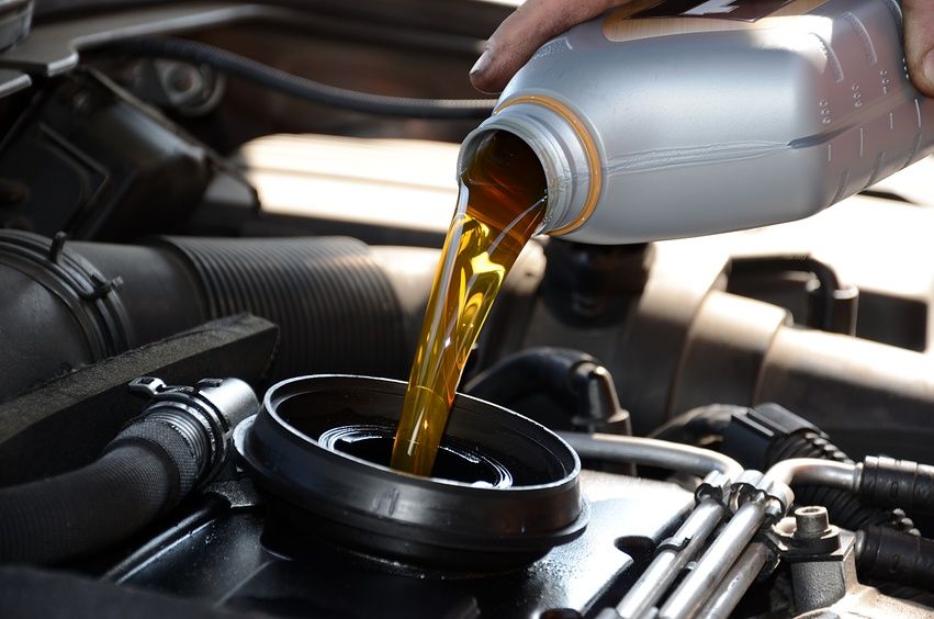 What should be done when renting a car if you have to change the car engine oil?